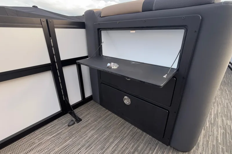 Slide: The Image of 2026 Viaggio Lago X24U interior storage compartment with open hatch and sleek design. - 32