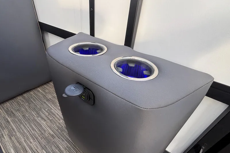 Slide: The Image of Cup holders with blue lighting in 2026 Viaggio Lago X24U boat interior. - 35