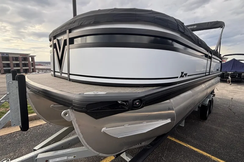 Slide: The Image of 2026 Viaggio Lago X24U pontoon boat on trailer, sleek design, parked outdoors. - 40