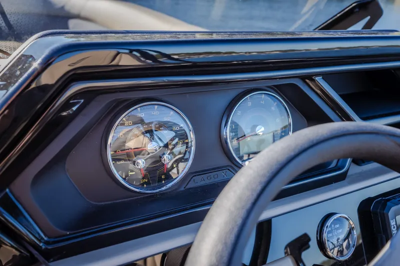 Slide: The Image of Dashboard of 2026 Viaggio Lago X24U with sleek gauges and steering wheel. - 19