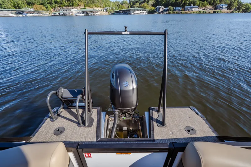 Slide: The Image of 2026 Viaggio Lago X24U pontoon boat with outboard motor on a serene lake. - 43