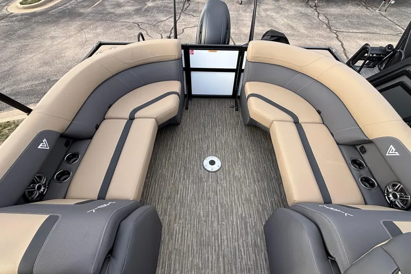 Slide: The Image of Luxurious seating on 2026 Viaggio Lago X24U pontoon boat, featuring beige and gray upholstery. - 6