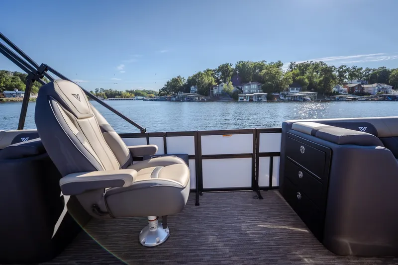 Slide: The Image of Luxurious Viaggio Lago X24U boat interior with comfortable seating, overlooking a serene lake view. - 21