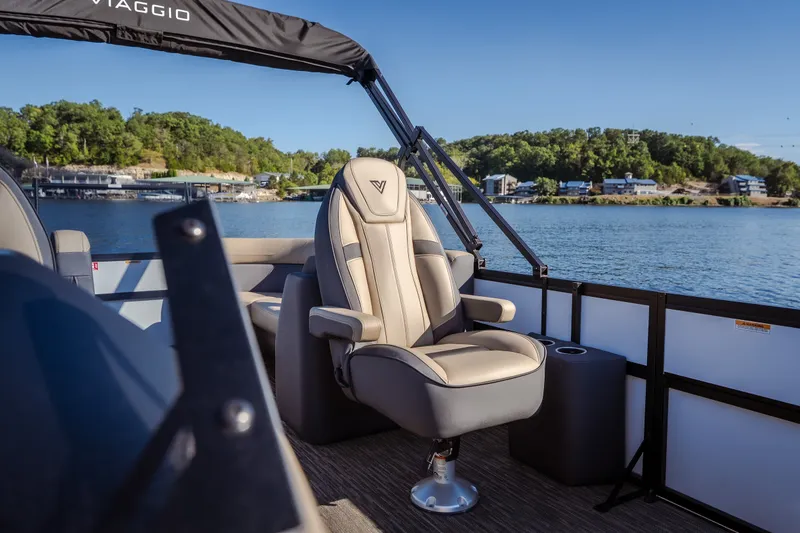 Slide: The Image of Viaggio Lago X24U 2026 boat interior with luxurious seating on a scenic lake. - 35