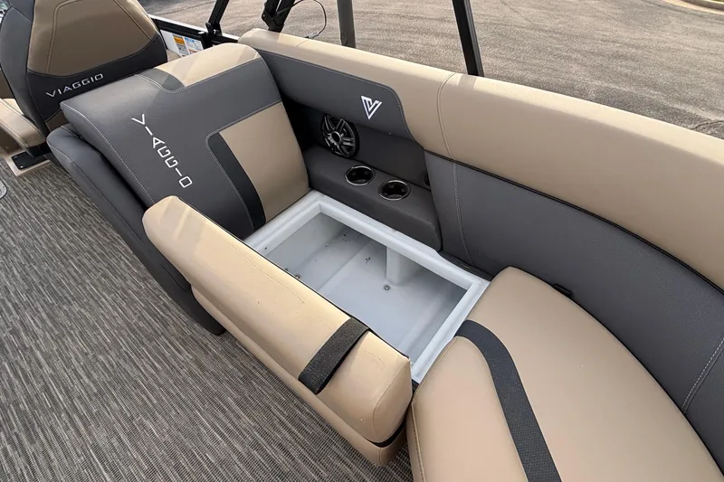 Slide: The Image of 2026 Viaggio Lago X24U boat interior with storage compartment and cup holders. - 8