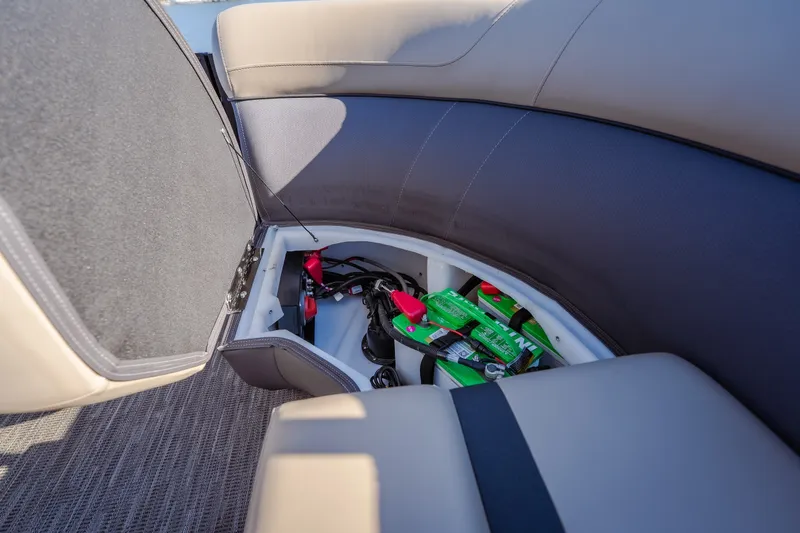 Slide: The Image of Storage compartment in 2026 Viaggio Lago X24U boat with visible battery and wiring. - 42