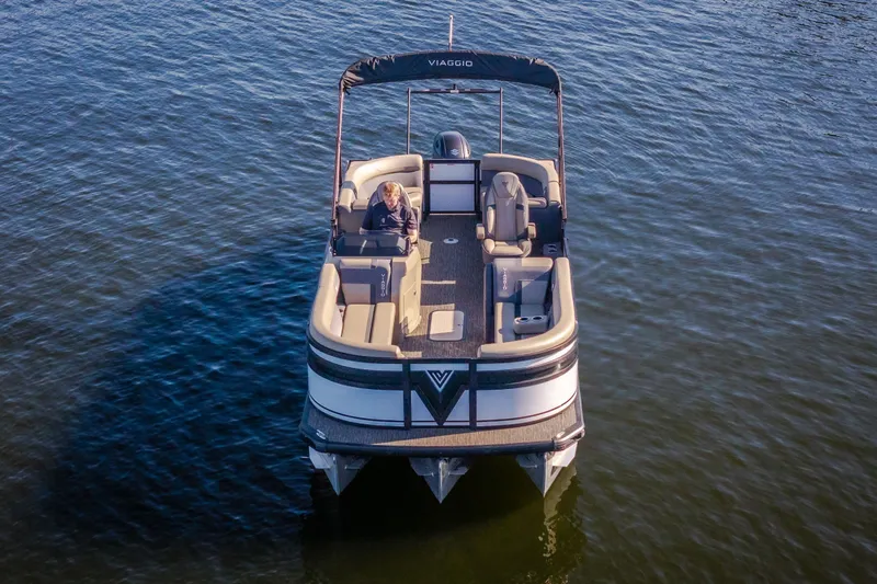 Slide: The Image of 2026 Viaggio Lago X24U pontoon boat on water, featuring spacious seating and modern design. - 6
