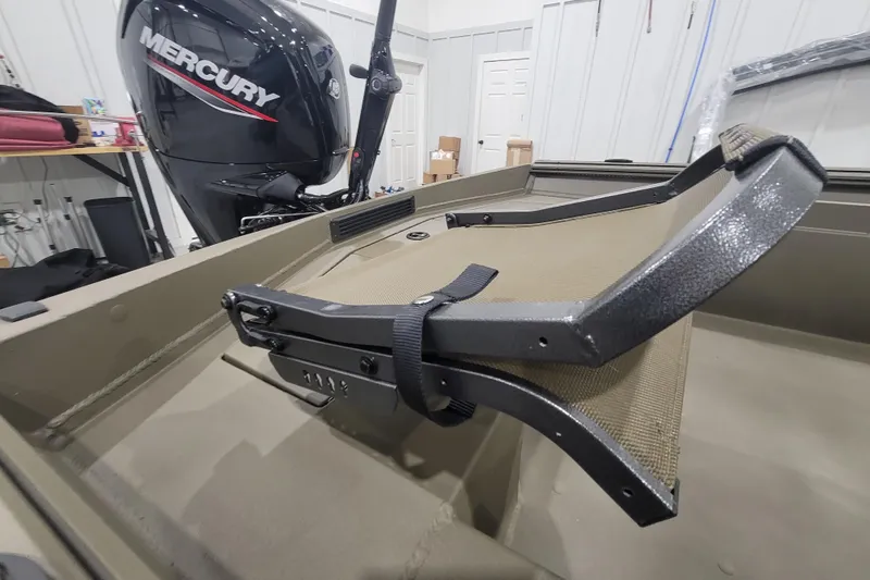 Slide: The Image of Boat interior with Mercury engine, featuring Thor 1860 Timber Hammer Elite, 2026 model. - 13