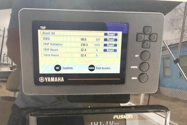 Slide: The Image of Yamaha trip display on 2019 Tidewater 2410 Bay Max showing fuel and distance data. - 13