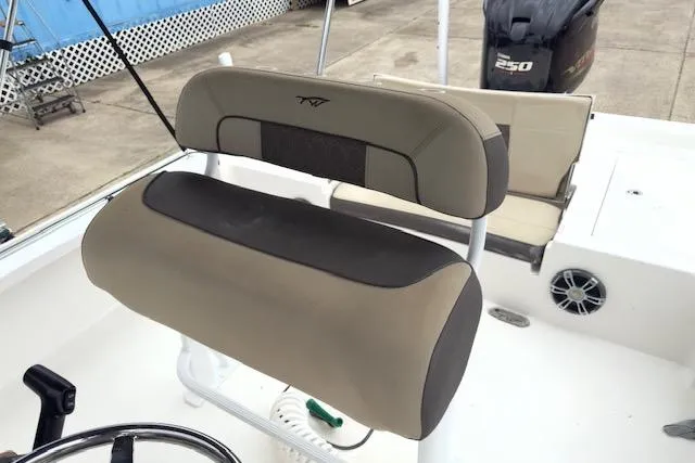 Slide: The Image of 2019 Tidewater 2410 Bay Max boat seat with beige and black upholstery. - 5