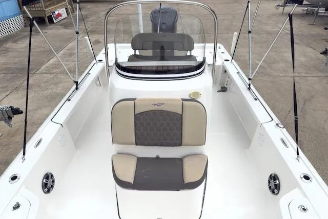 Slide: The Image of 2019 Tidewater 2410 Bay Max boat interior with seating and console. - 9
