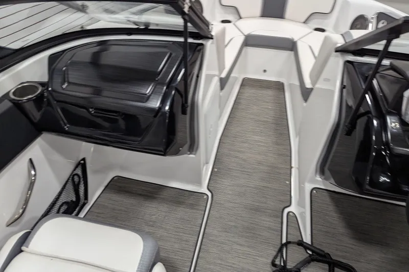 Slide: The Image of Interior of 2023 Scarab 195 ID boat, featuring sleek seating and modern design elements. - 11