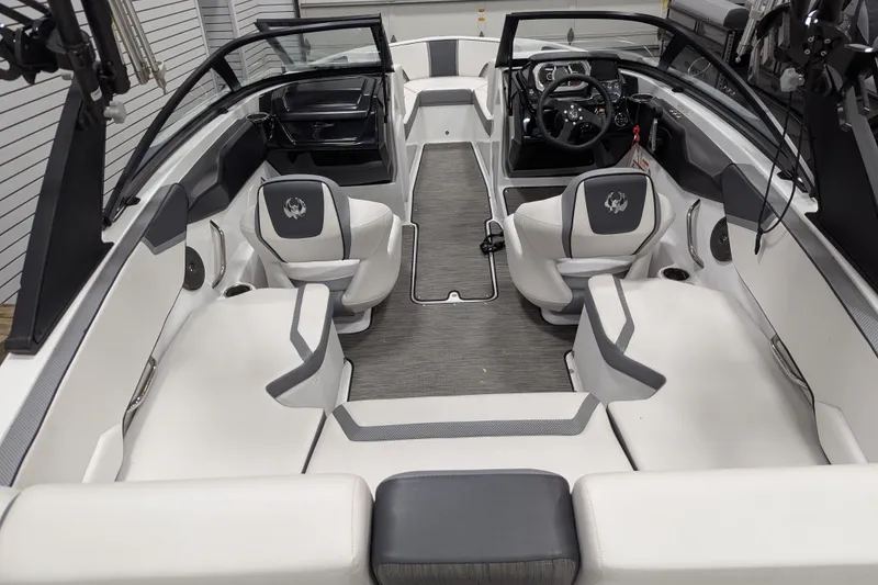 Slide: The Image of 2023 Scarab 195 ID boat interior with modern seating and sleek design. - 4