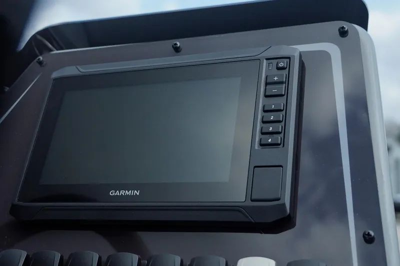 Slide: The Image of Garmin display on 2025 SunCatcher Fusion 324RCX boat dashboard. - 16