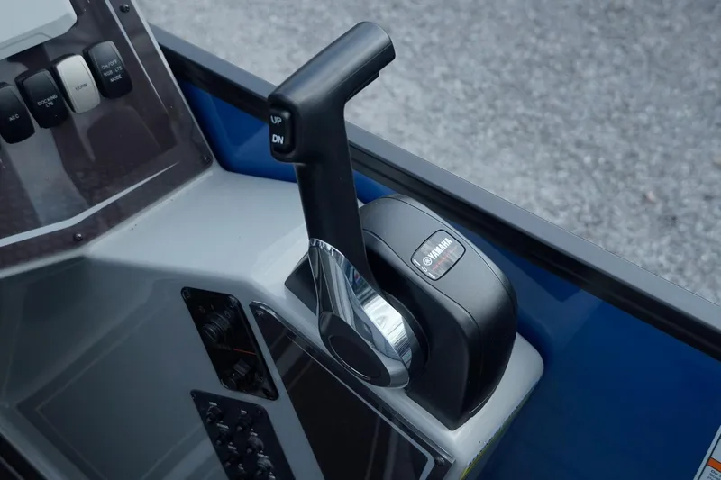 Slide: The Image of Control panel of 2025 SunCatcher Fusion 324RCX boat with Yamaha throttle lever. - 17