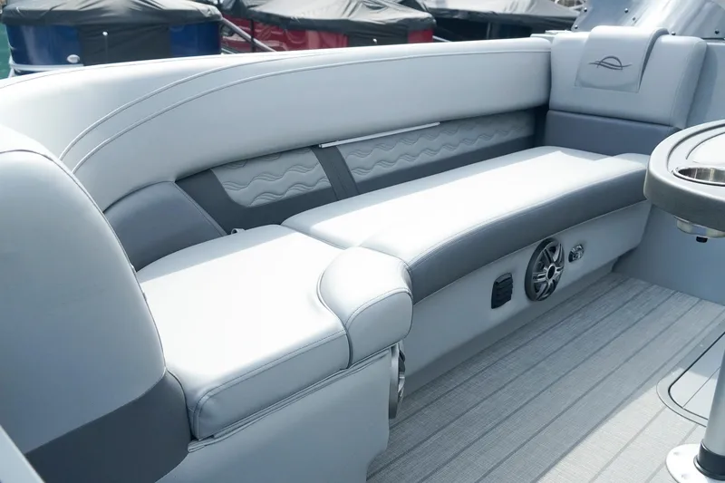 Slide: The Image of Luxurious seating on 2025 SunCatcher Fusion 324RCX boat, featuring sleek design and modern amenities. - 24