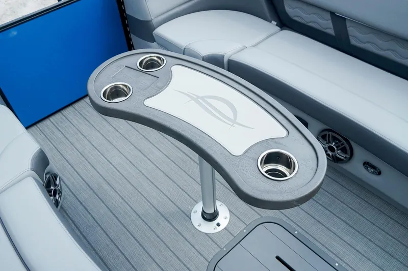 Slide: The Image of Interior of 2025 SunCatcher Fusion 324RCX boat with cup holders and seating. - 27