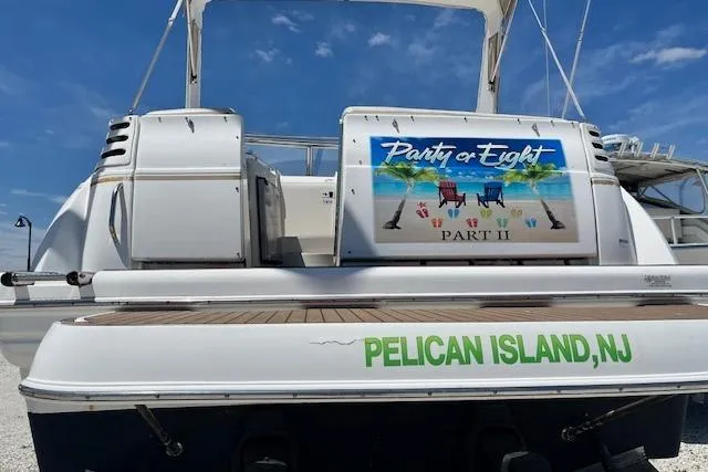 Slide: The Image of 2004 Larson 330 boat with "Party of Eight" sign, Pelican Island, NJ. - 10