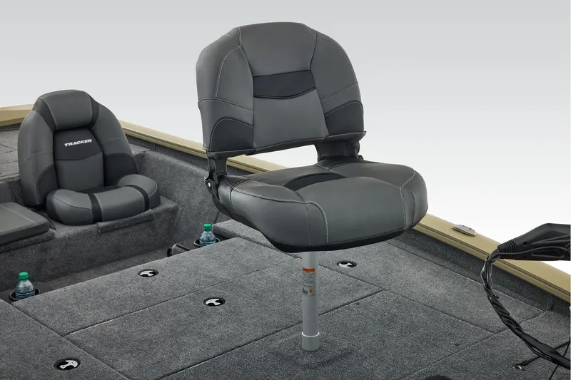 Slide: The Image of Manufacturer Provided Image: 2026 Tracker Pro Team 195 boat interior with gray cushioned seats and carpeted deck. - 26