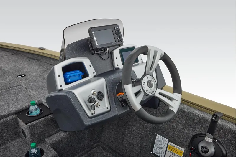 Slide: The Image of Manufacturer Provided Image: 2026 Tracker Pro Team 195 boat dashboard with steering wheel and control panel. - 39