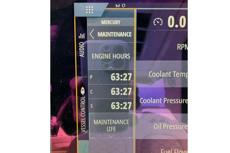Slide: The Image of Display screen showing engine hours and maintenance data for 2021 Sea Ray Sundancer 320 Coupe Outboard. - 10