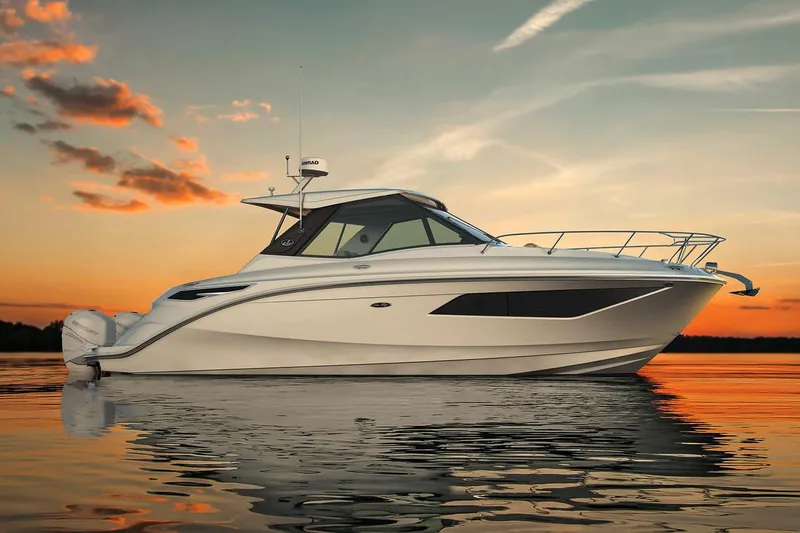 Slide: The Image of Manufacturer Provided Image: 2021 Sea Ray Sundancer 320 Coupe OB at sunset on calm water. - 12