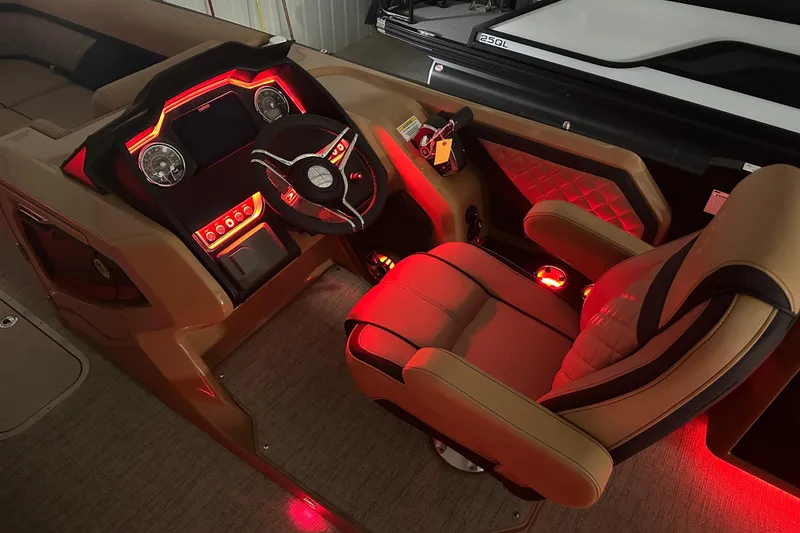 Slide: The Image of Luxurious interior of 2026 Godfrey AquaPatio 255 DFL with ambient blue lighting. - 11