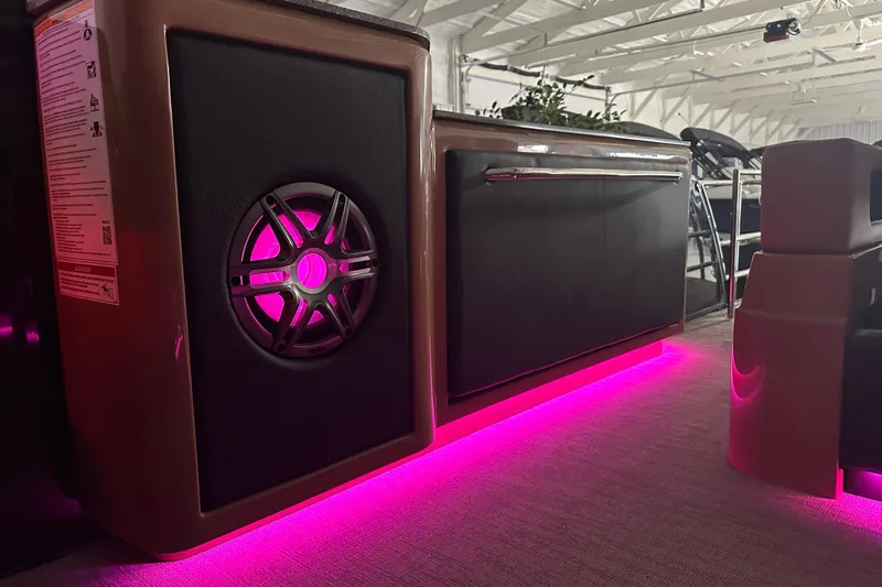 Slide: The Image of Luxurious 2026 Godfrey AquaPatio 255 DFL interior with ambient pink lighting and plush seating. - 8