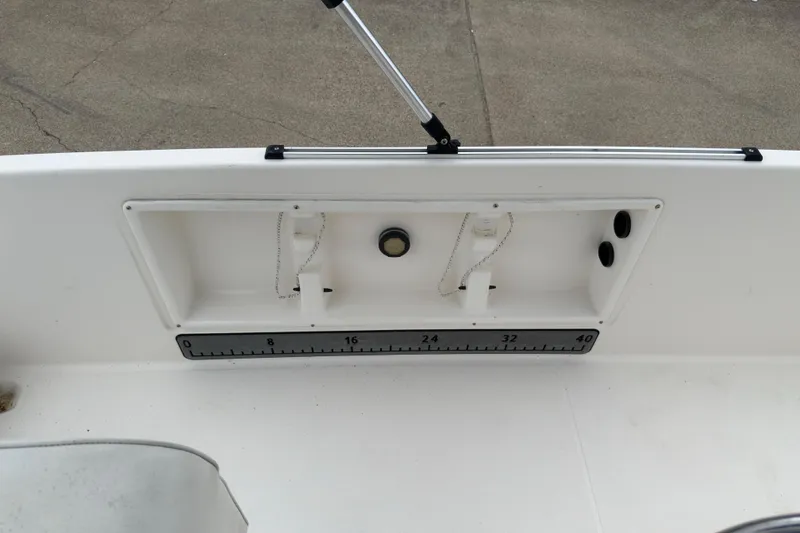 Slide: The Image of 2022 Bayliner Trophy T21Bay boat interior with built-in measuring ruler. - 11