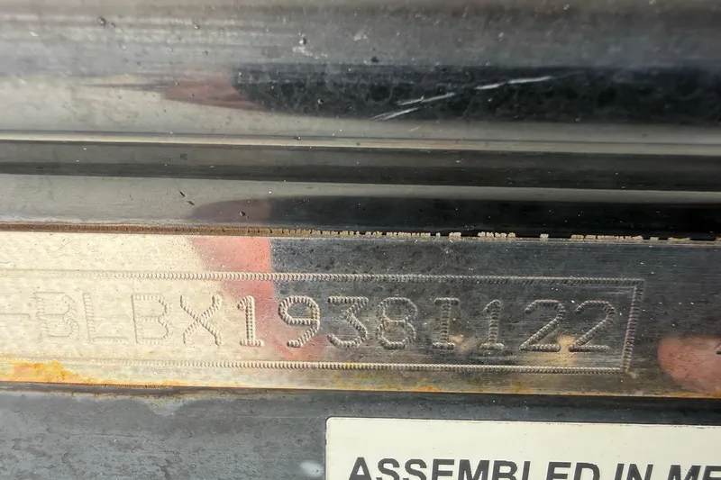 Slide: The Image of Close-up of a 2022 Bayliner Trophy T21Bay serial number plate. - 14