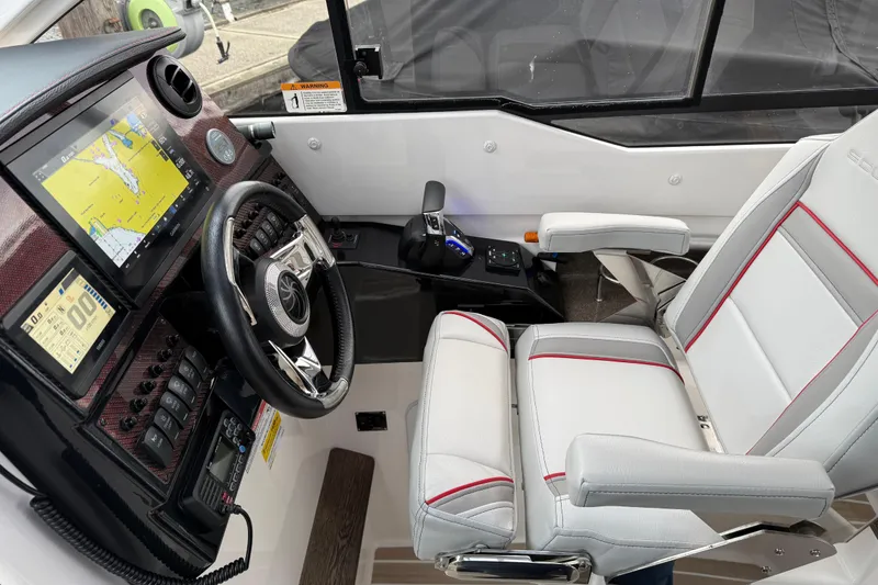 Slide: The Image of 2024 Solara S-250 Coupe cockpit with modern navigation system and luxurious seating. - 12