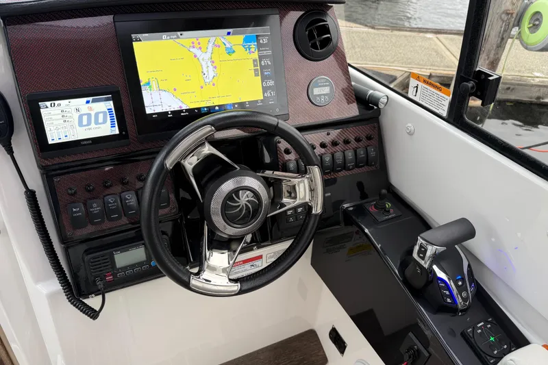 Slide: The Image of 2024 Solara S-250 Coupe dashboard with navigation screens and modern controls. - 15