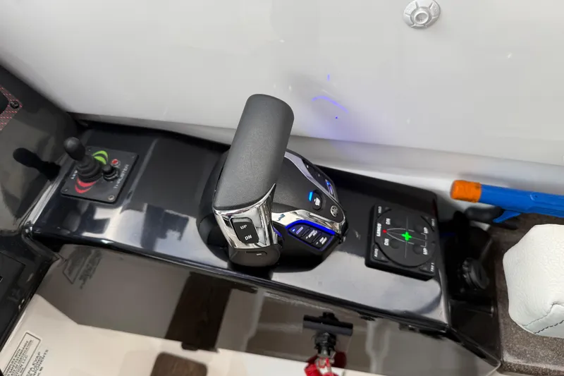 Slide: The Image of 2024 Solara S-250 Coupe control panel with joystick and throttle lever. - 23