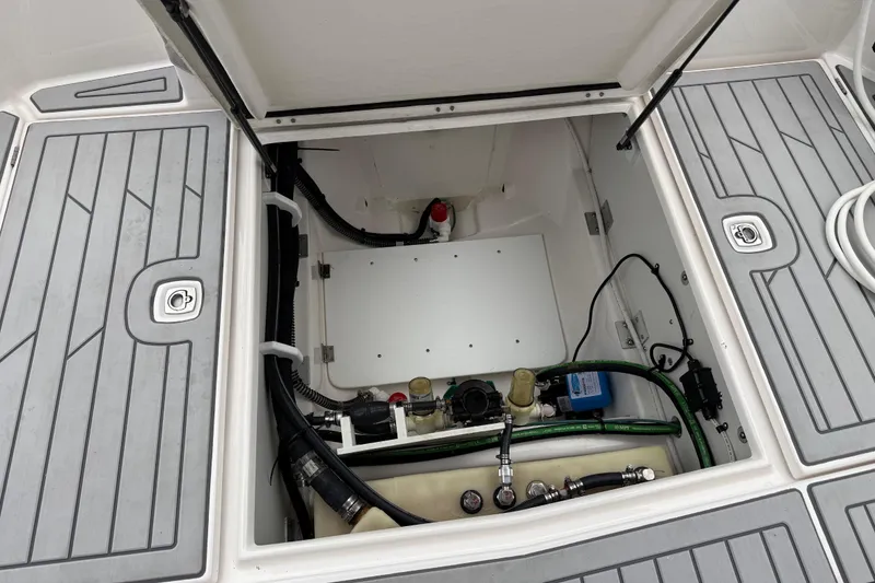 Slide: The Image of 2024 Solara S-250 Coupe engine compartment with visible wiring and components. - 47