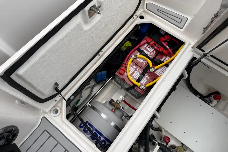 Slide: The Image of 2024 Solara S-250 Coupe battery compartment with Dakota Lithium batteries and wiring. - 48