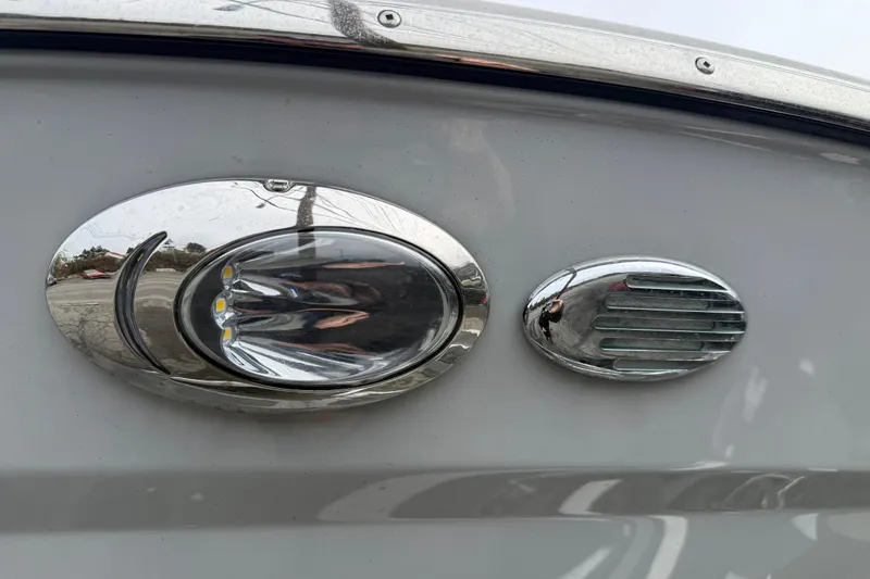 Slide: The Image of 2024 Solara S-250 Coupe chrome detail with LED lights and sleek design. - 60