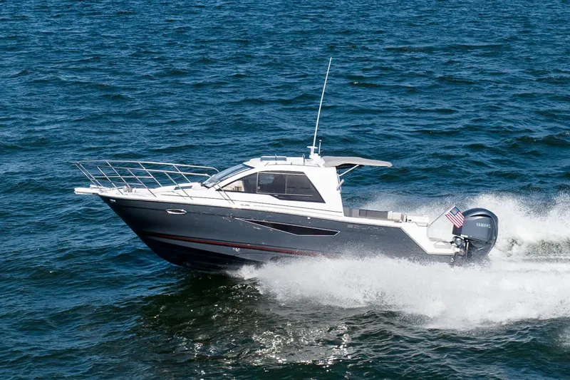 Slide: The Image of Manufacturer Provided Image: 2024 Solara S-250 Coupe boat cruising on open water. - 63