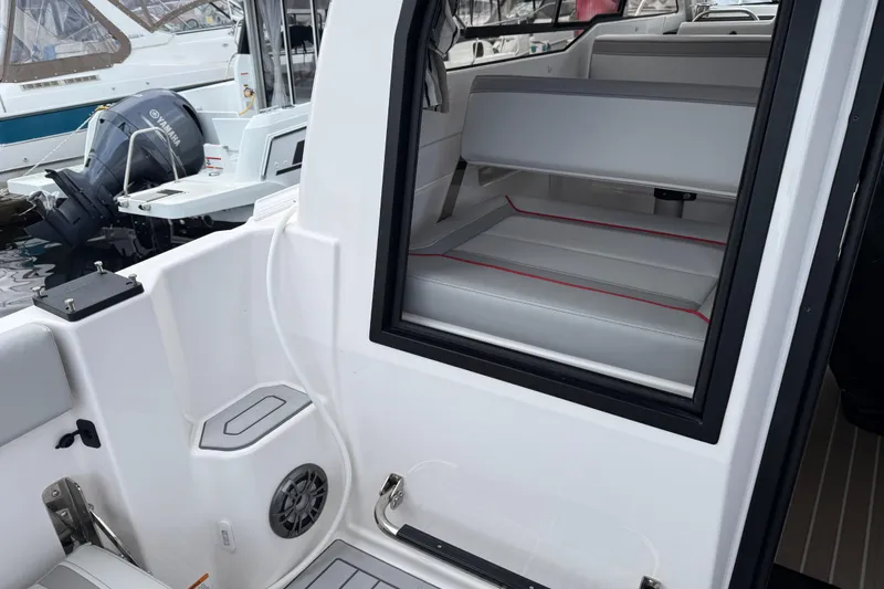 Slide: The Image of 2024 Solara S-250 Coupe interior view with seating and boat details. - 7