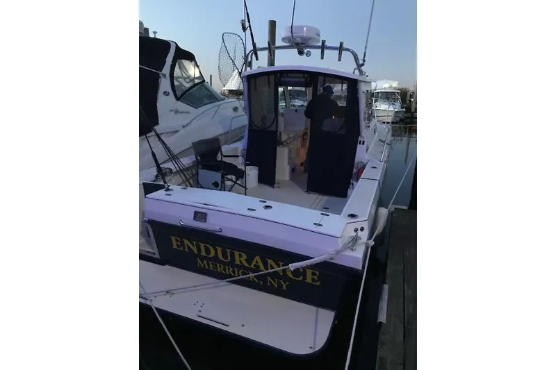 Slide: The Image of 2005 Albin 28 Tournament Express boat docked, named "Endurance," Merrick, NY. - 4