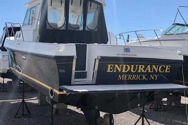 Slide: The Image of 2005 Albin 28 Tournament Express boat named "Endurance" in Merrick, NY, on stands. - 5