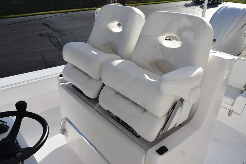 Slide: The Image of Luxurious white seating on 2026 Contender 29 Bay boat, featuring ergonomic design and premium materials. - 13