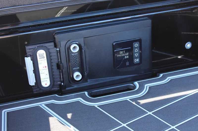 Slide: The Image of Control panel of 2026 Tigé Ultré 25ZX boat, featuring inflate and deflate options. - 12
