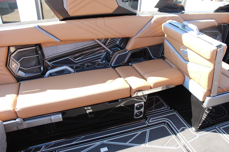 Slide: The Image of 2026 Tigé Ultré 25ZX interior with tan leather seating and modern design elements. - 17