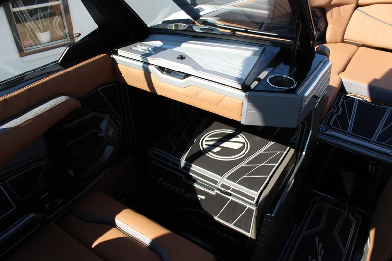 Slide: The Image of 2026 Tigé Ultré 25ZX interior with sleek design, luxurious seating, and modern amenities. - 22