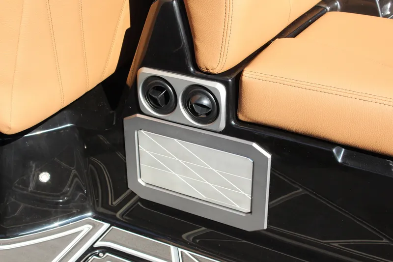 Slide: The Image of 2026 Tigé Ultré 25ZX interior detail with tan leather seats and sleek design elements. - 30