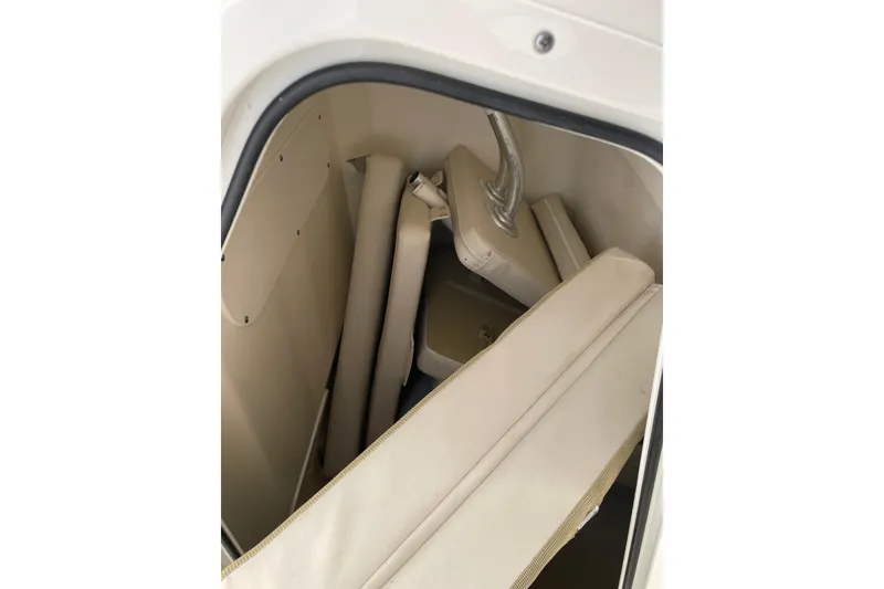 Slide: The Image of Interior storage compartment of 2025 Boston Whaler 210 Montauk boat. - 3