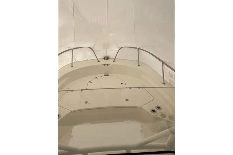 Slide: The Image of 2025 Boston Whaler 210 Montauk boat interior with sleek design and spacious layout. - 4