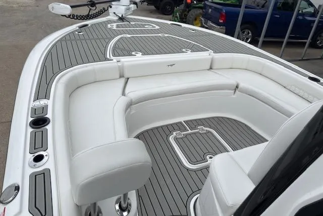 Slide: The Image of 2026 Tidewater 2500 Carolina Bay boat with sleek seating and modern deck design. - 14