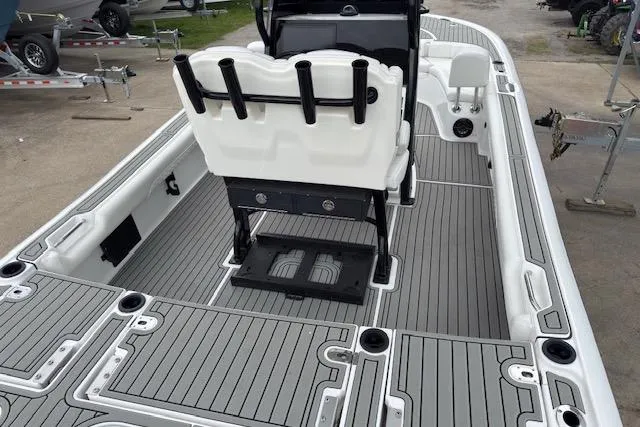 Slide: The Image of 2026 Tidewater 2500 Carolina Bay boat interior with sleek, modern design and spacious deck layout. - 6