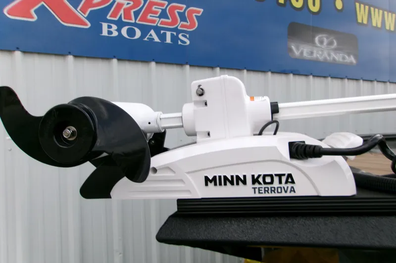 Slide: The Image of Minn Kota Terrova motor on 2026 Xpress H22B Bay boat, displayed at dealership. - 18